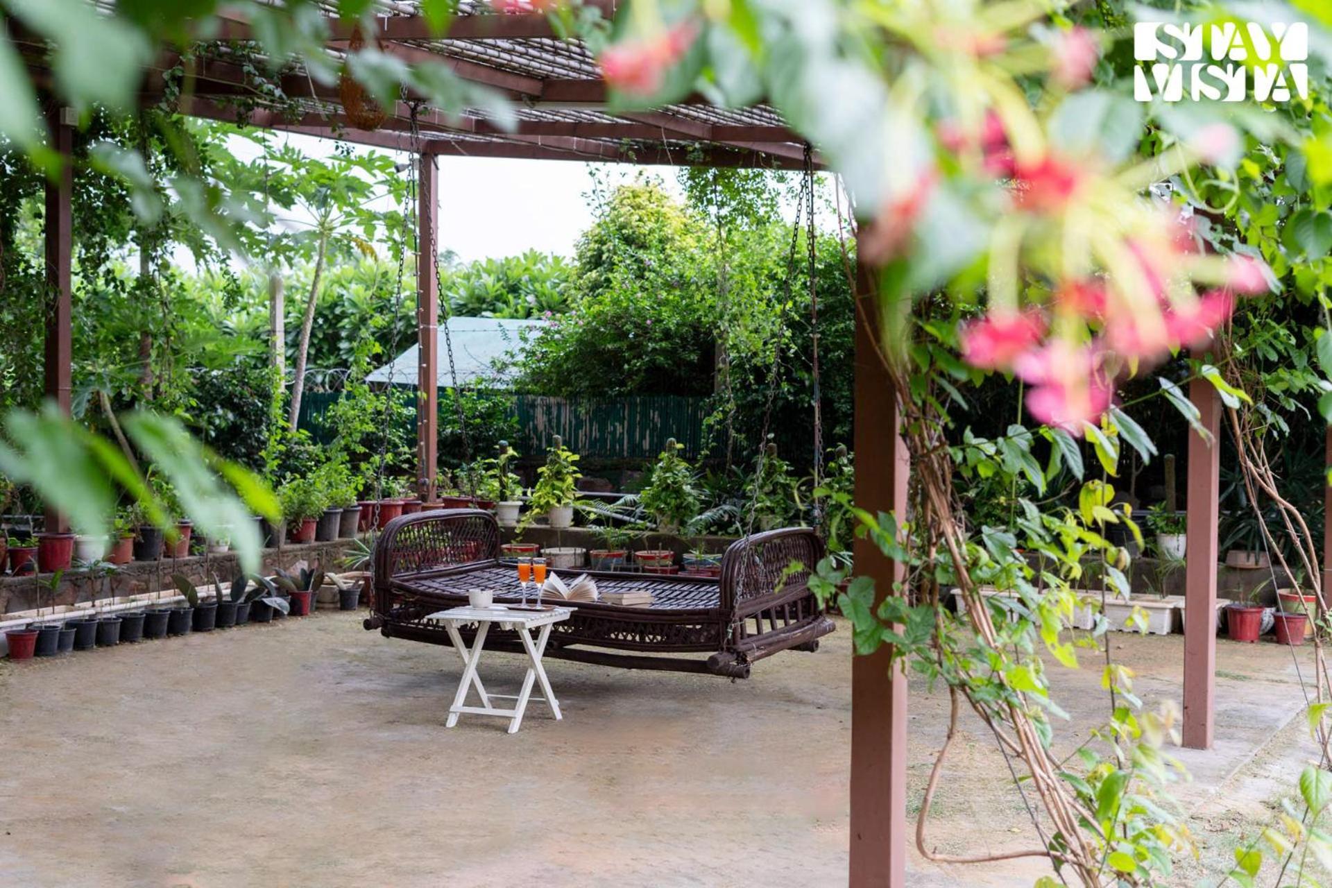 Stayvista's Glasshouse: Orchard Farmstay with Pool and Relaxation Gurgaon Exterior photo